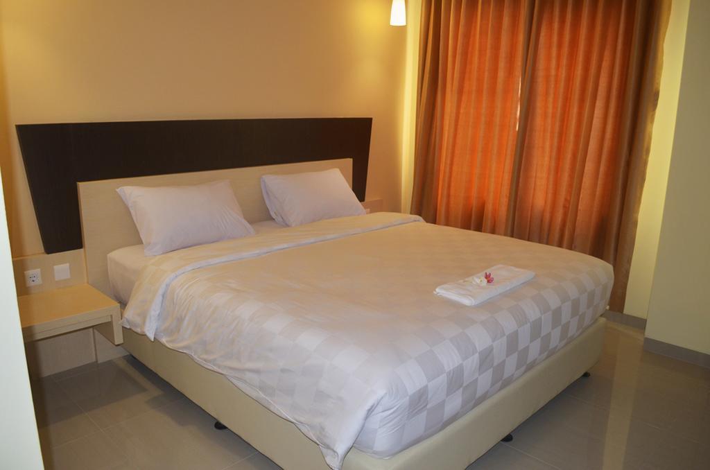 M Hotel Матарам Стая снимка