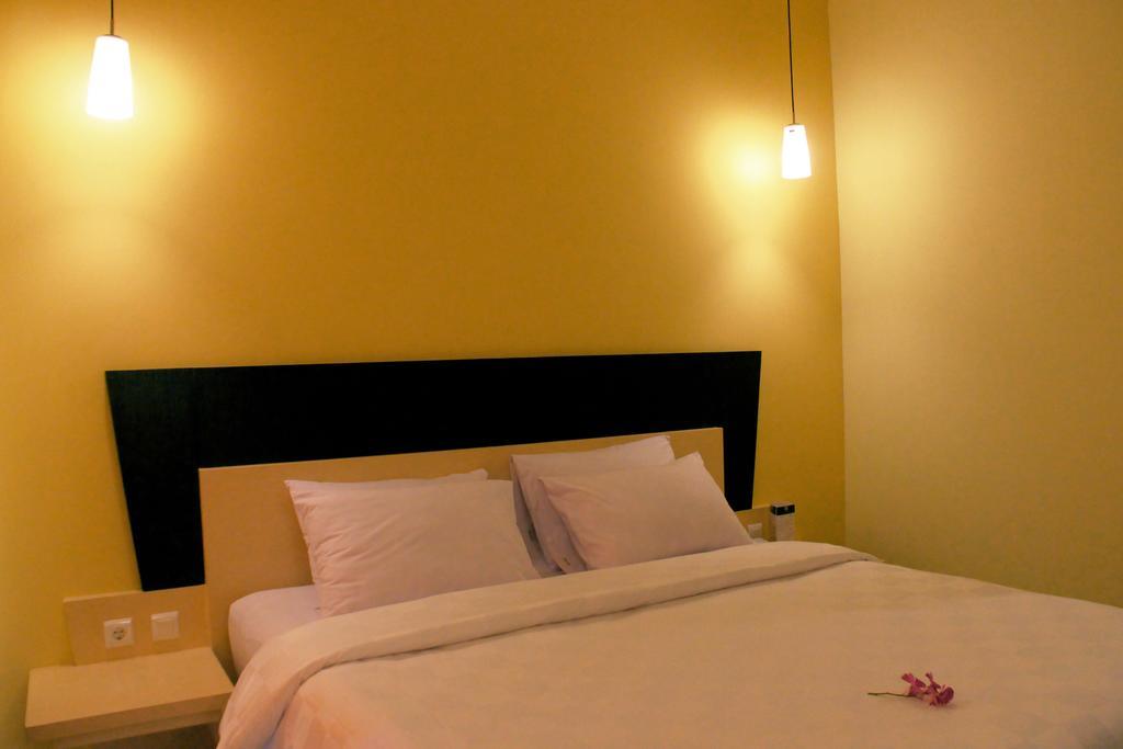 M Hotel Матарам Стая снимка