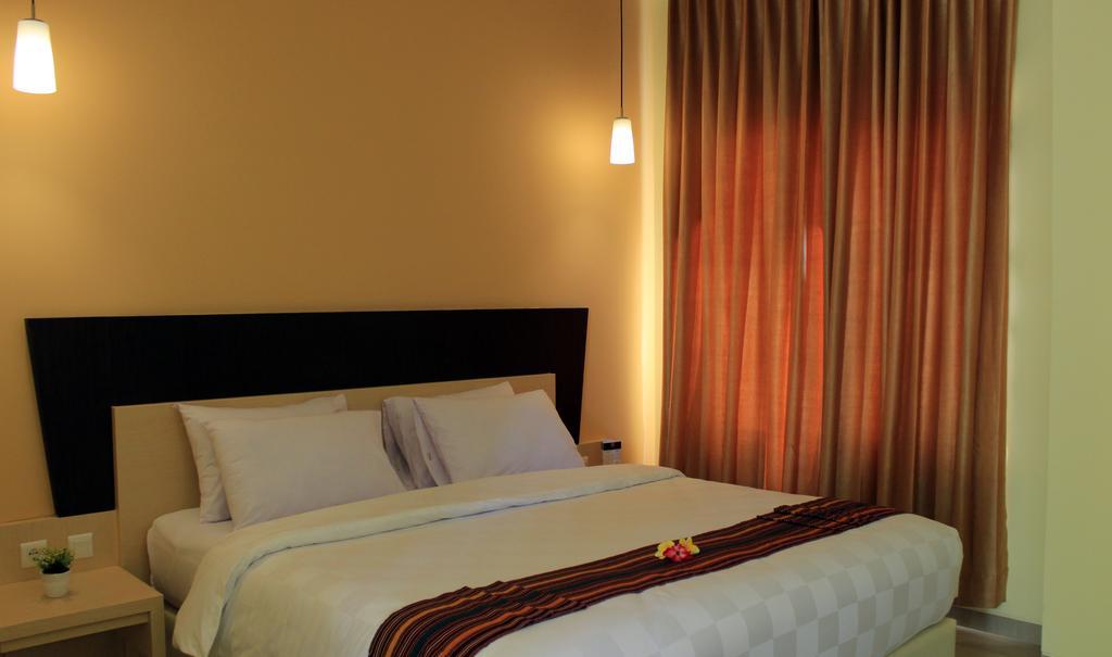M Hotel Матарам Стая снимка